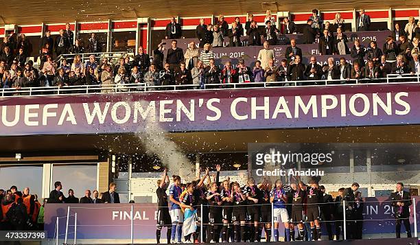 Frankfurt's players lift the UEFA Women's Champions League winners trophy after the UEFA Women's Champions League final match between 1. FFC...