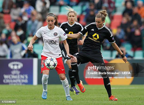 Simone Laudehr of Frankfurt battles for the ball with Kosovare Asllani of Paris during the UEFA Women's Champions League final match between 1. FFC...