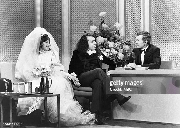Pictured: Co-host Ed McMahon, Victoria May "Miss Vicki" Budinger, Tiny Tim, host Johnny Carson on December 17 1969 --