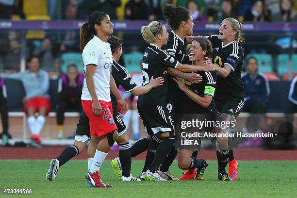 Kerstin Garefrekes of 1. FFC Frankfurt celebrates victory with her team mates after winning the UEFA Women's Champions League final match between 1....