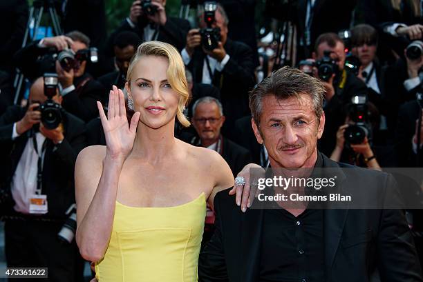 Actors Sean Penn and Charlize Theron attend the premiere of "Mad Max: Fury Road" during the 68th annual Cannes Film Festival on May 14, 2015 in...