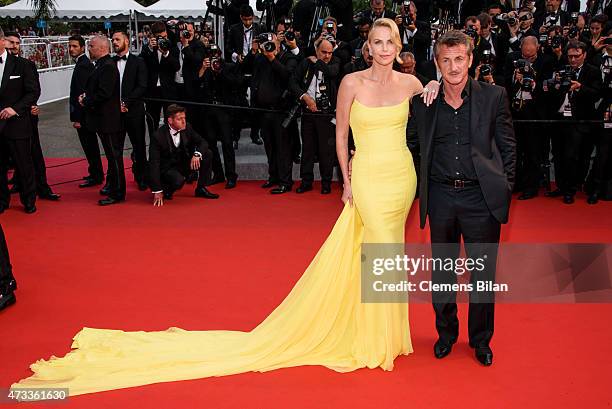 Actors Sean Penn and Charlize Theron attend the premiere of "Mad Max: Fury Road" during the 68th annual Cannes Film Festival on May 14, 2015 in...