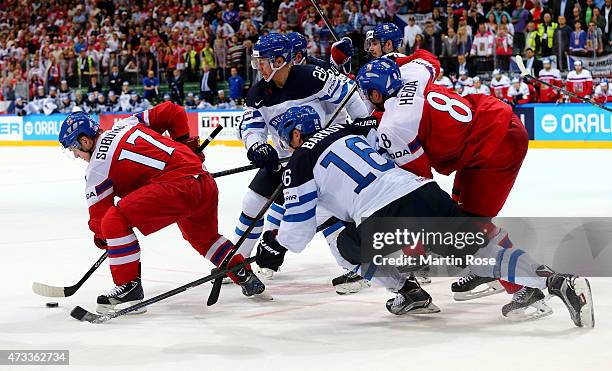 Aleksander Barkov of Finland and Vladimir Sobotka of Czech Republic battle for the puck during the IIHF World Championship quarter final match...
