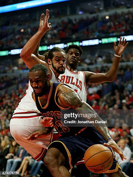 LeBron James of the Cleveland Cavaliers drives against Joakim Noah of the Chicago Bulls in the first quarter during Game Six of the Eastern...