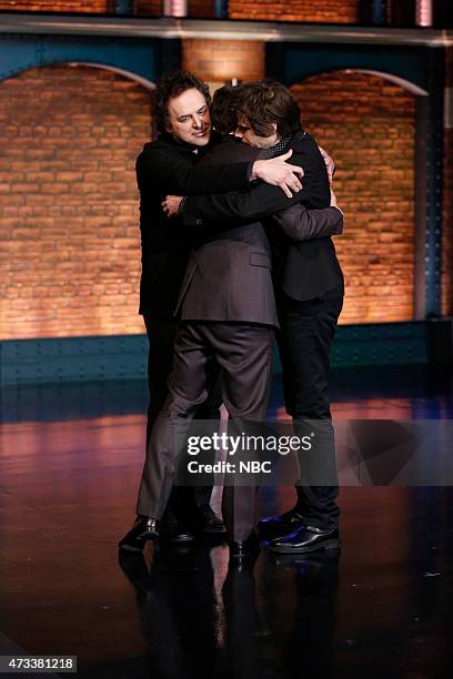 Episode 207 -- Pictured: Tom Scharpling & Jon Wurster, hosts of The Best Show, give host Seth Meyers a hug on May 14, 2015 --