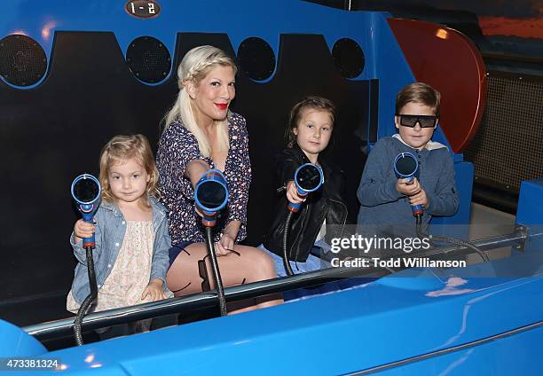 Tori Spelling, and kids Hattie McDermott, Stella McDermott and Liam McDermott ride Knott's Berry Farm's newest ride Voyage To The Iron Reef at...