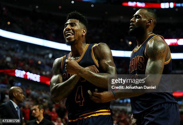 Iman Shumpert and LeBron James of the Cleveland Cavaliers react in the second quarter against the Chicago Bulls during Game Six of the Eastern...