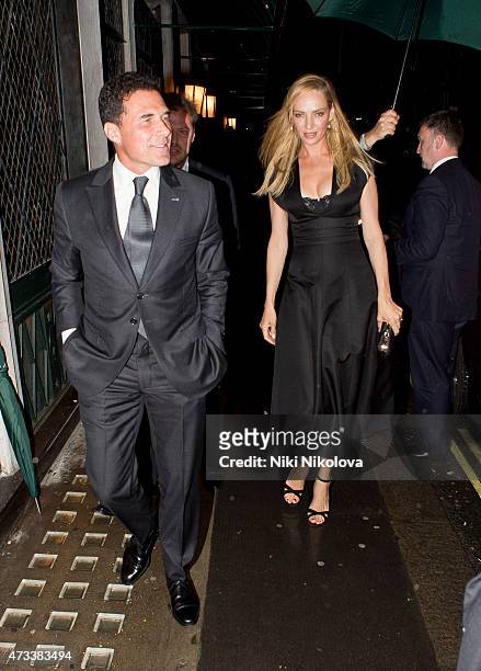 May 14: Andre Balazs and Uma Thurman are seen arriving at the Ivy restaurant, Soho on May 14, 2015 in London, England.