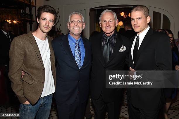 Grant Gustin, Mark Pedowitz, President of The CW Network, Victor Garber and Wentworth Miller attend the CW Network's 2015 Upfront party at Park...