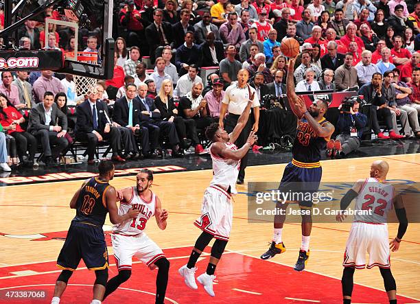 LeBron James of the Cleveland Cavaliers shoots the ball against the Chicago Bulls at the United Center During Game Six of the Eastern Conference...