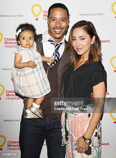 Brian White and his family arrive at launch event for "Put Your Money Where The Miracles Are" campaign held at Avalon on May 14, 2015 in Hollywood,...