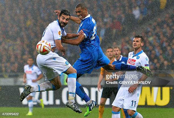 Dnipro's Douglas vies with SSC Napoli's Raul Albiol during the UEFA Europa League semi-final second leg football match between FC Dnipro and SSC...