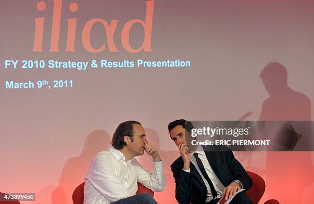 French telecom group Iliad founder, Deputy Chairman of the Board of Directors and Chief Strategy Officer Xavier Niel talks with Thomas Reynaud, Chief...