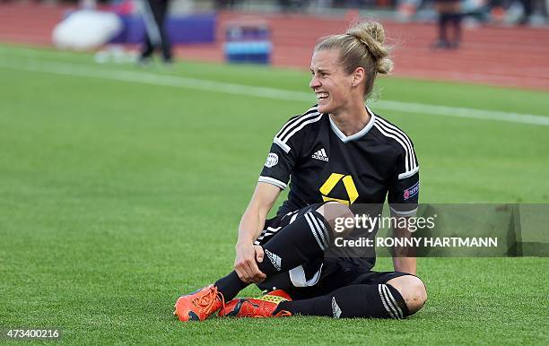 Frankfurt's midfielder Simone Laudehr sits on the pitch during the UEFA Champions League women football match final Paris Saint-Germain vs 1 FCC...