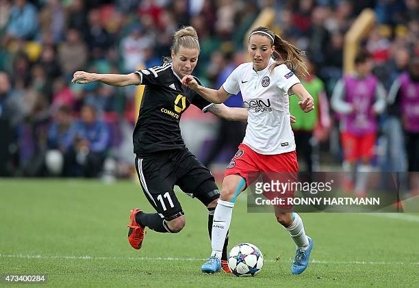 Frankfurt's midfielder Simone Laudehr vies with Paris Saint-Germain's Swedish forward Kosovare Asllani during the UEFA Champions League women...