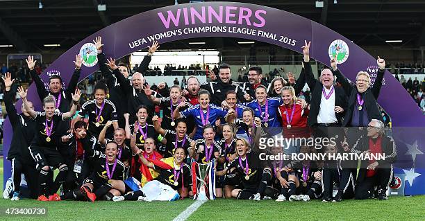 Frankfurt's team poses with the trophy after their 2-1 win in the UEFA Champions League women football match final Paris Saint-Germain vs 1 FFC...