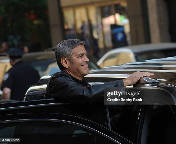 George Clooney exits the "Late Show With David Letterman" on May 14, 2015 in New York City.