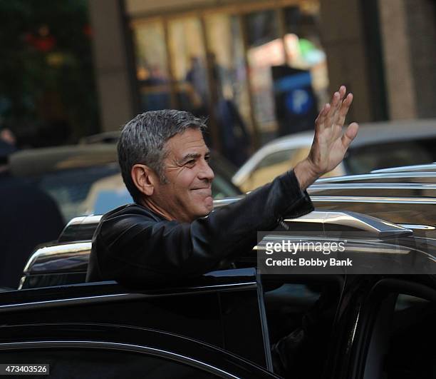 George Clooney exits the "Late Show With David Letterman" on May 14, 2015 in New York City.