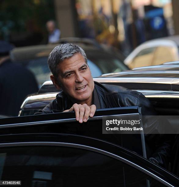 George Clooney exits the "Late Show With David Letterman" on May 14, 2015 in New York City.