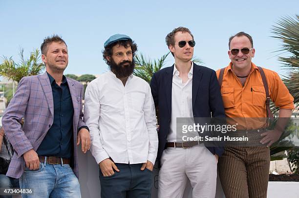 Actors Levente Molnar and Geza Rohrig, director Laszlo Nemes, and actor Urs Rechn attends the "Saul Fia" Photocall during the 68th annual Cannes Film...