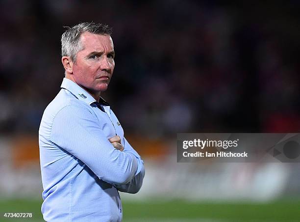 Cowboys coach Paul Green looks on before the start of the round 10 NRL match between the North Queensland Cowboys and the Brisbane Broncos at...