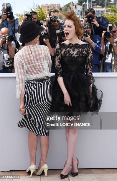 Actresses Parker Posey and Emma Stone pose during a photocall for the film "Irrational Man" at the 68th Cannes Film Festival in Cannes, southeastern...