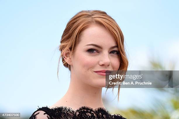 Emma Stone poses at the photocall for Louis Vuitton Cruise