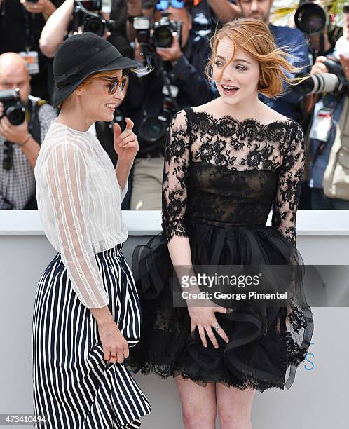 Actresses Parker Posey and Emma Stone attends the "Irrational Man" Photocall during the 68th annual Cannes Film Festival on May 15, 2015 in Cannes,...