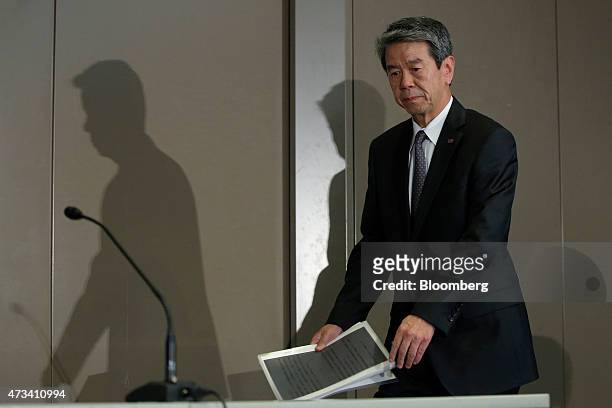 Hisao Tanaka, president and chief executive officer of Toshiba Corp., arrives for a news conference at the company's headquarters in Tokyo, Japan, on...