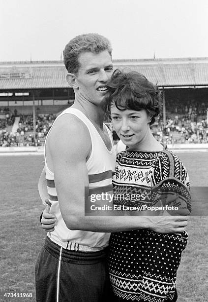 Robbie Brightwell with his fiance Ann Packer during the Great Britain v Poland track and field event at the White City Stadium in London on 15th...