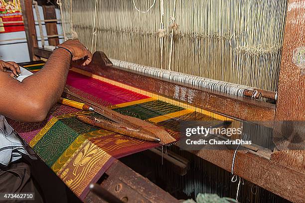 kanchipuram, tamil nadu, india - weaving the famous brightly coloured kanchipuram silk sari on a handloom. - silk sari stock pictures, royalty-free photos & images