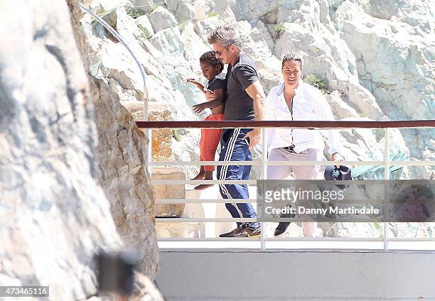 Sean Penn and Jackson Theron are seen at the Hotel du Cap-Eden-Roc day 3 of the 68th annual Cannes Film Festival on May 15, 2015 in Cannes, France.