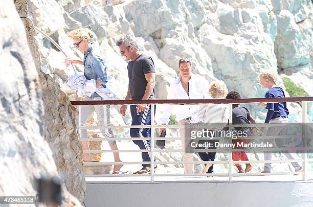 Charlize Theron, Sean Pennn and Jackson Theron is seen at the Hotel du Cap-Eden-Roc day 3 of the 68th annual Cannes Film Festival on May 15, 2015 in...