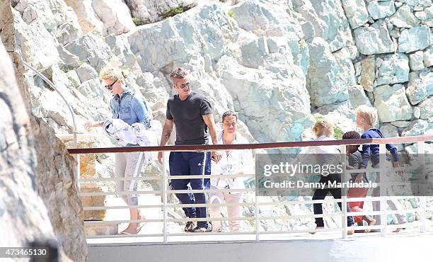 Charlize Theron, Sean Pennn and Jackson Theron is seen at the Hotel du Cap-Eden-Roc day 3 of the 68th annual Cannes Film Festival on May 15, 2015 in...