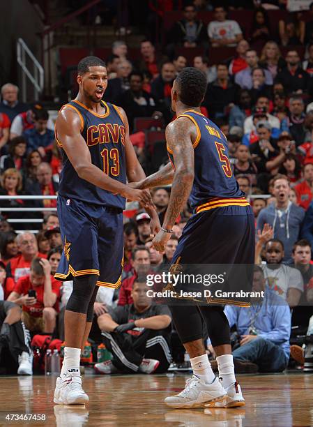 Smith and Tristan Thompson of the Chicago Bulls congratulate each other against the Cleveland Cavaliers at the United Center During Game Six of the...