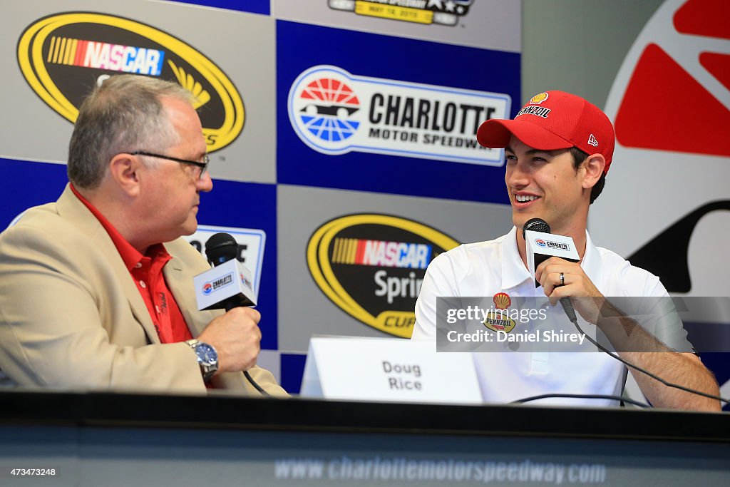 Doug Rice, a broadcaster for PRN, and Joey Logano, driver for the ...