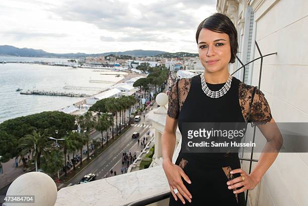 Michelle Rodriguez poses on the balcony of The Avakian Suite during The 68th Annual Cannes Film Festival at The Carlton on May 15, 2015 in Cannes,...
