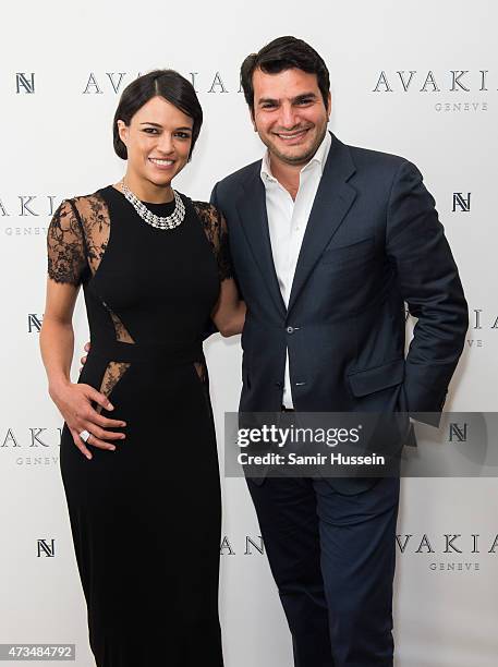 Michelle Rodriguez poses with Haig Avakian as she visits The Avakian Suite during The 68th Annual Cannes Film Festival>> at The Carlton on May 15,...