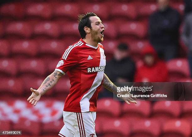 Lee Tomlin of Middlesbrough celebrates as he scores their first goal during the Sky Bet Championship Playoff semi final second leg match between...