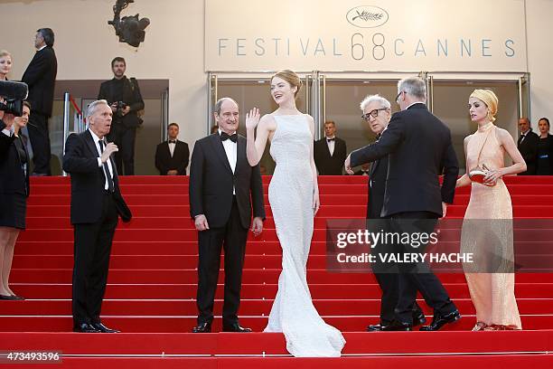 Actress Emma Stone, US director Woody Allen and US actress Parker Posey (R pose with the President of the Cannes Film Festival Pierre Lescure and the...