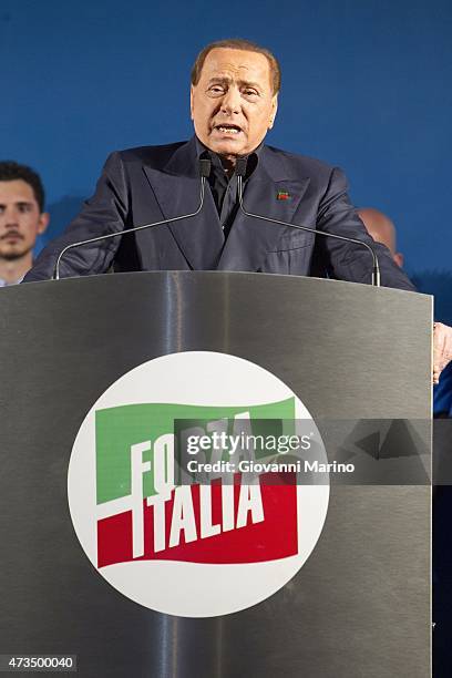 Leader of Forza Italia party Silvio Berlusconi speaks during a meeting as he promotes Adriana Poli Bortone candidate for the next regional elections...