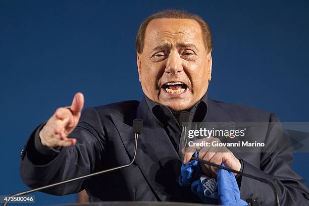 Leader of Forza Italia party Silvio Berlusconi speaks during a meeting as he promotes Adriana Poli Bortone candidate for the next regional elections...