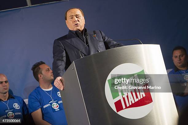 Leader of Forza Italia party Silvio Berlusconi speaks during a meeting as he promotes Adriana Poli Bortone candidate for the next regional elections...