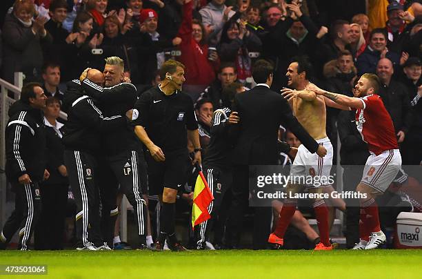 Enrique Garcia Kike of Middlesbrough celebrates with the team bench as he scores their second goal during the Sky Bet Championship Playoff semi final...