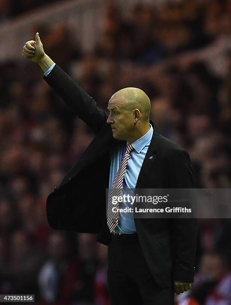 Mark Warburton manager of Brentford gives a thumbs up during the Sky Bet Championship Playoff semi final second leg match between Middlesbrough and...