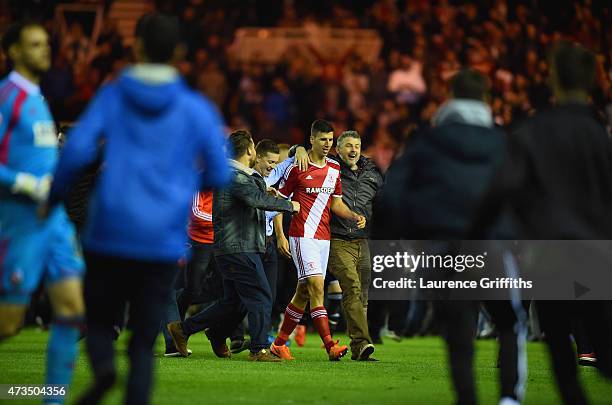 Daniel Ayala of Middlesbrough celebrates on the pitch with fans as they reach the final after the Sky Bet Championship Playoff semi final second leg...