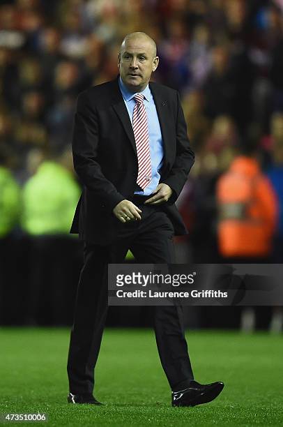 Mark Warburton manager of Brentford looks on after defeat in the Sky Bet Championship Playoff semi final second leg match between Middlesbrough and...