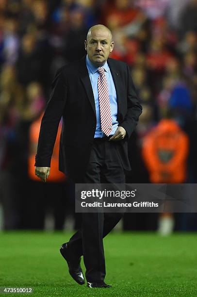 Mark Warburton manager of Brentford looks on after defeat in the Sky Bet Championship Playoff semi final second leg match between Middlesbrough and...