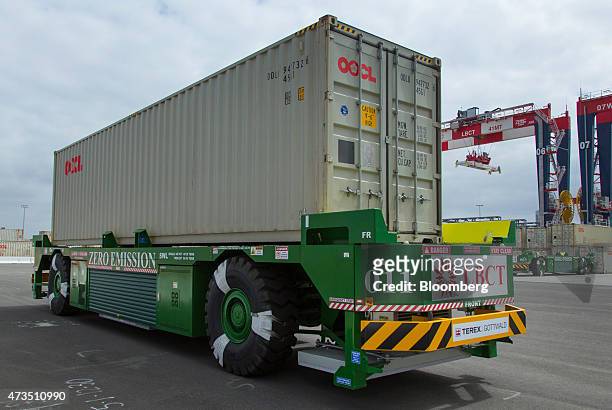 Container is transported by an automated guided vehicle during the testing phase of the Long Beach Container Terminal in Middle Harbor at the Port of...