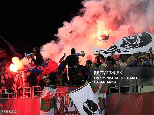 Ajaccio's supporters celebrate after their team won the French L2 football match between GFC Ajaccio and Niort and accessing to the French L1 next...